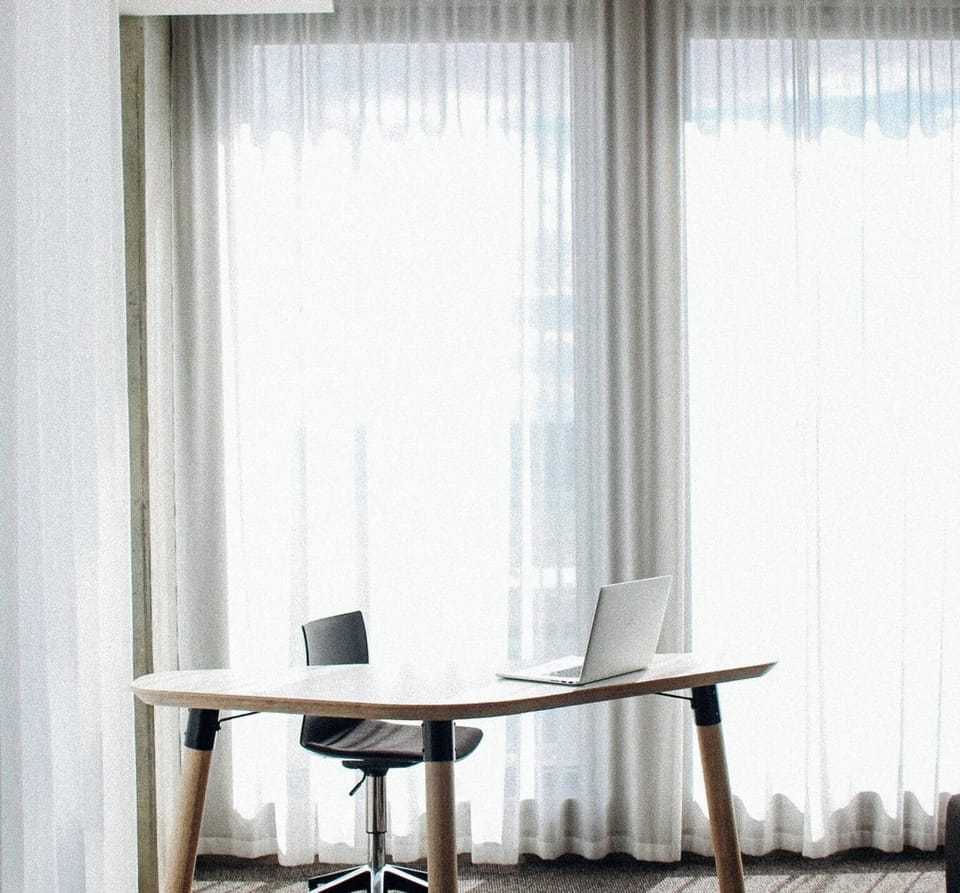 Work comfortably with natural light and a dedicated desk.
