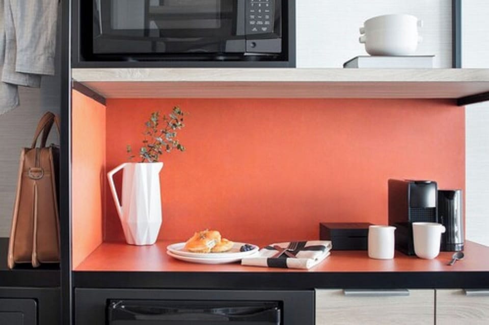 Start mornings with in-room coffee and easy snack setup.