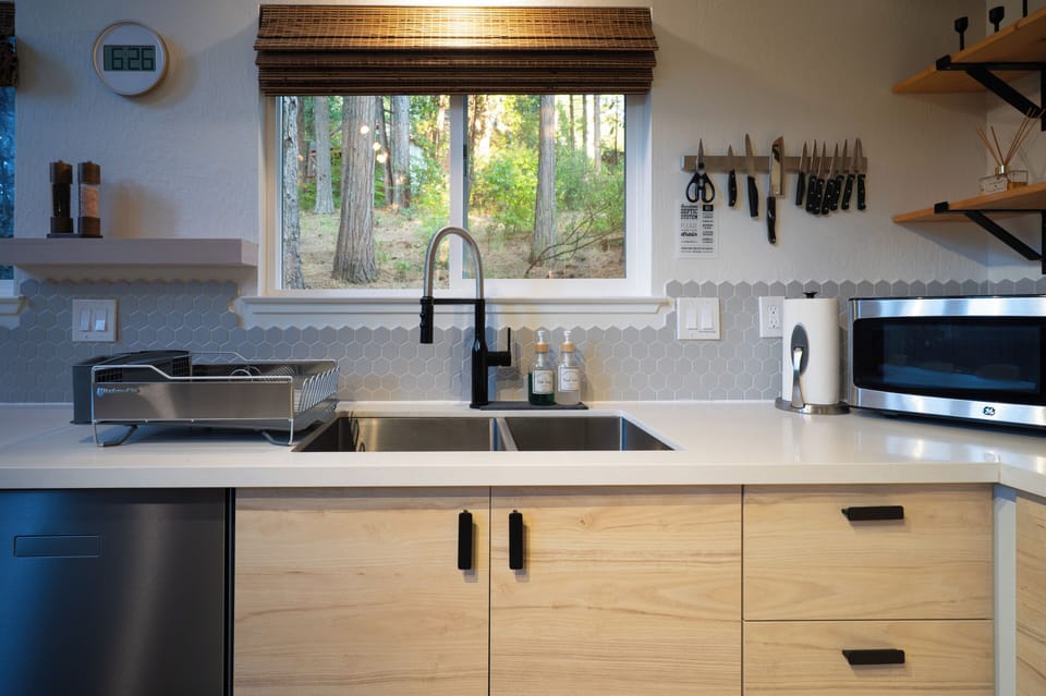 Kitchen has microwave and dishwasher