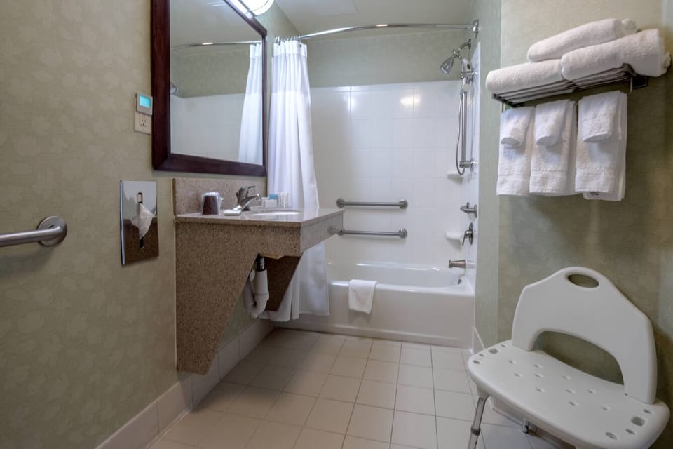 Refresh comfortably with a clean tub-shower and plush towels.