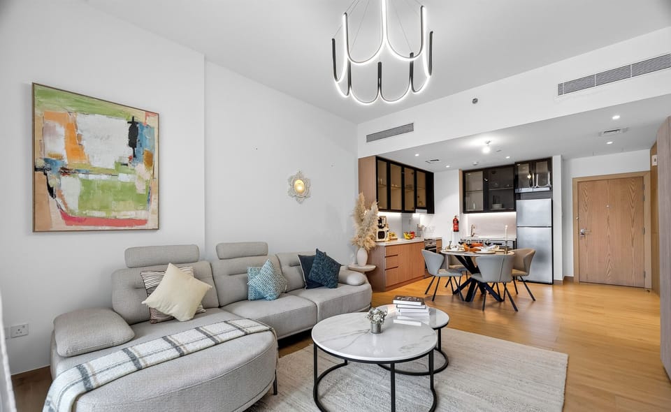 Standard Apartment, Sea View | Living room | 65-inch Smart TV with digital channels, Netflix, streaming services