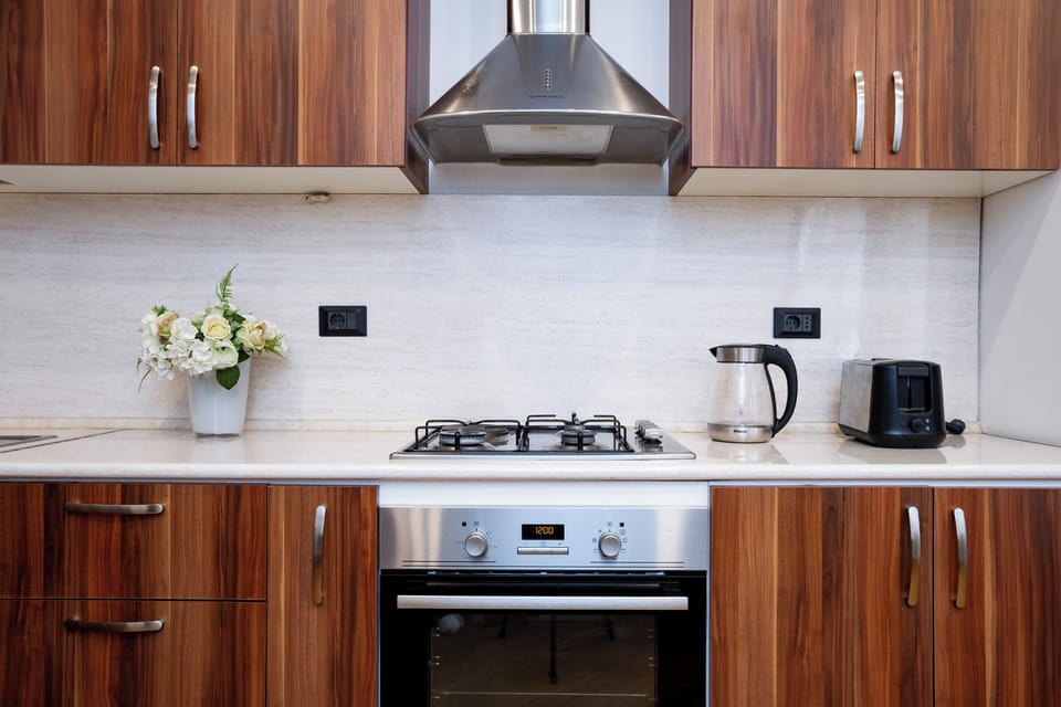 Apartment, 2 Bedrooms, Balcony | Private kitchen | Coffee/tea maker, electric kettle, cookware/dishes/utensils, freezer
