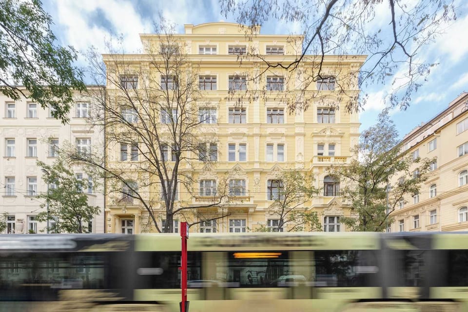 Tram stop is just in front of the building