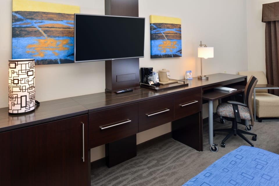 Hypo-allergenic bedding, down comforters, pillowtop beds, in-room safe