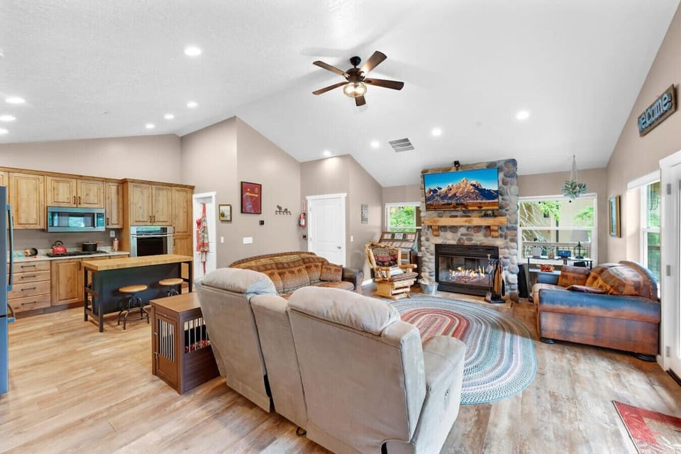Charming living space with a glowing fireplace.