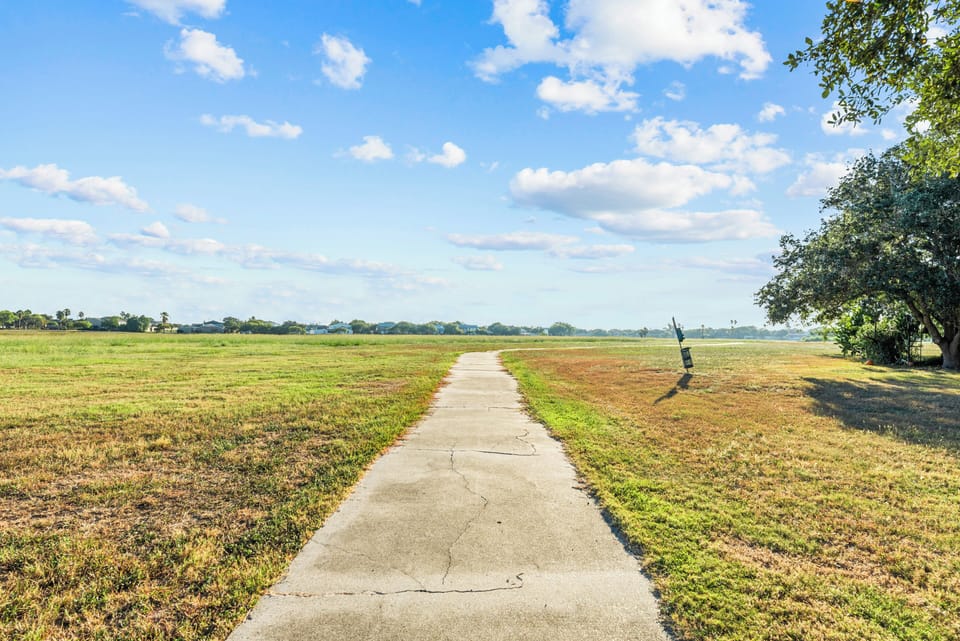 Walking trail. - located steps away from front door