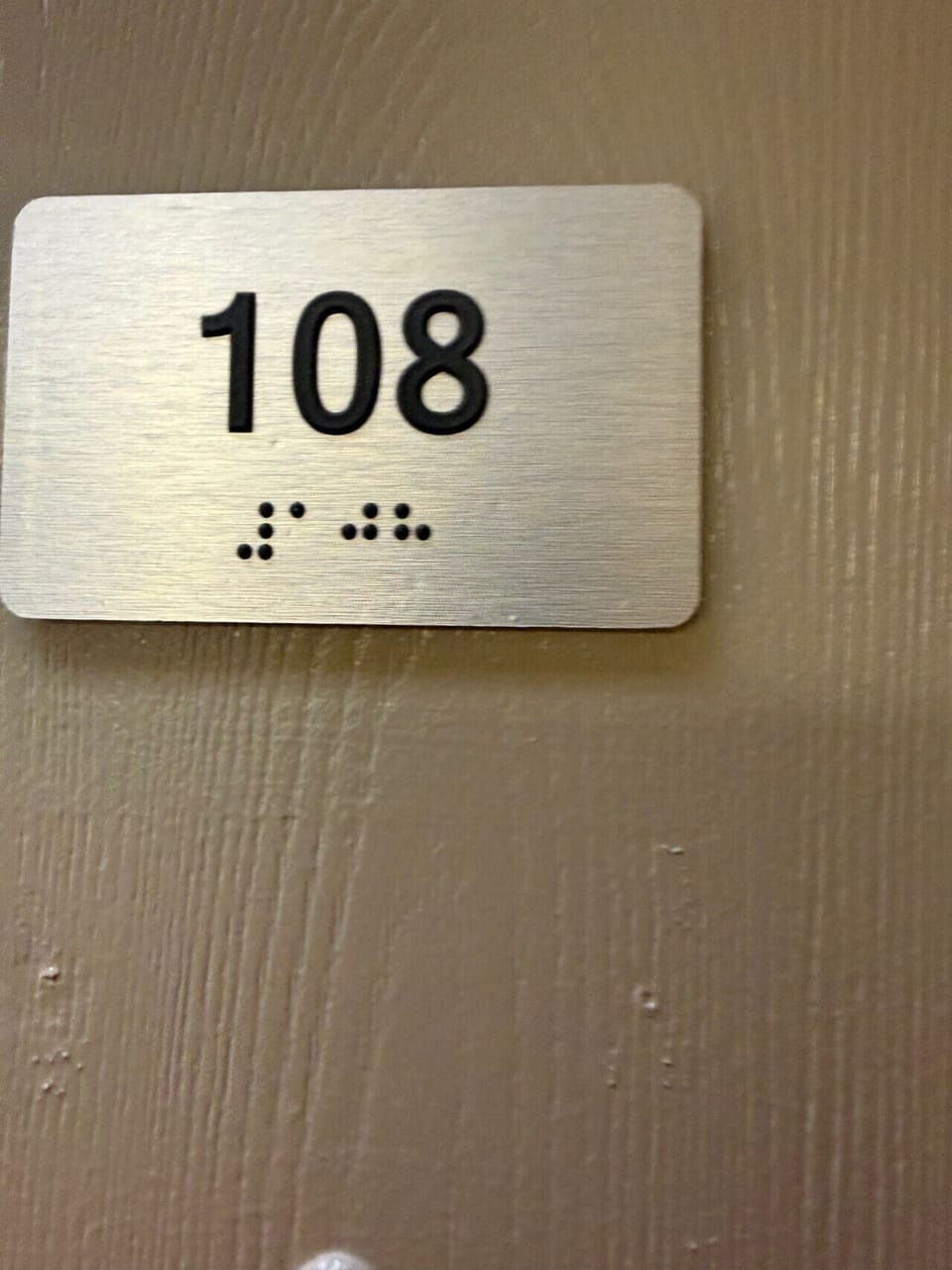 Numbered guest door offering clear identification for easy navigation.