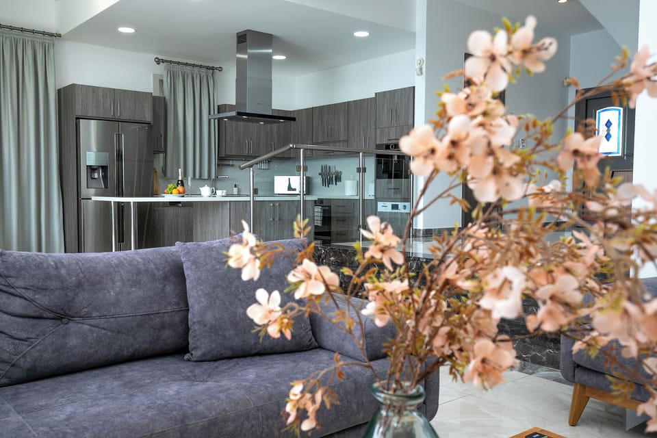 Luxury Villa, Sea View | Living area | 86-inch Smart TV with digital channels, fireplace, Netflix