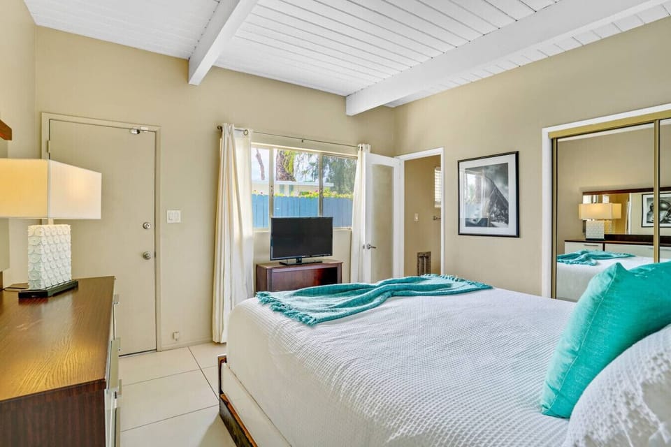 Smart TV and cozy vibes for lazy mornings.