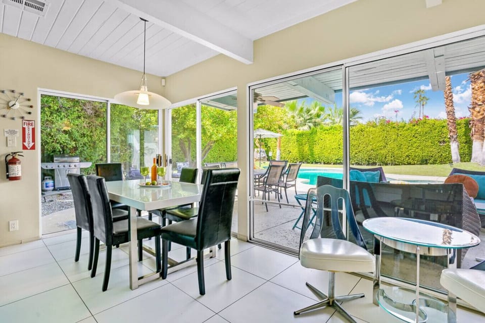 Gather for meals around the spacious dining table.