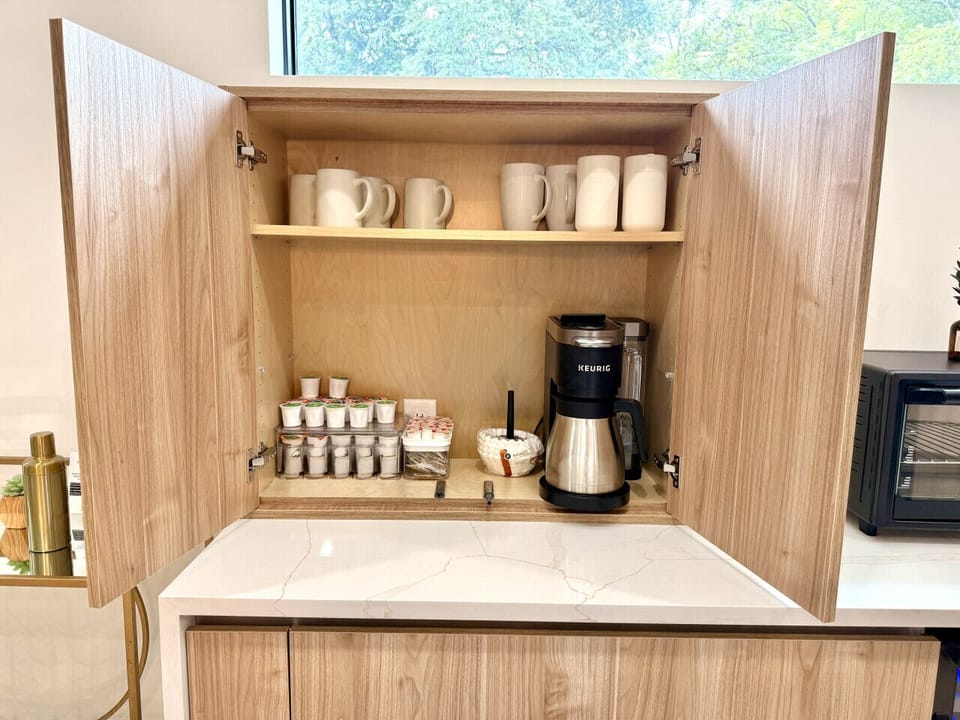 Enjoy your morning at the fully stocked coffee station with dual Keurig + drip machine and complimentary K-Cups