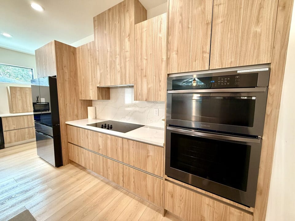 Fully stocked modern kitchen with sleek appliances, spacious counters, and everything you need to cook and enjoy meals at home