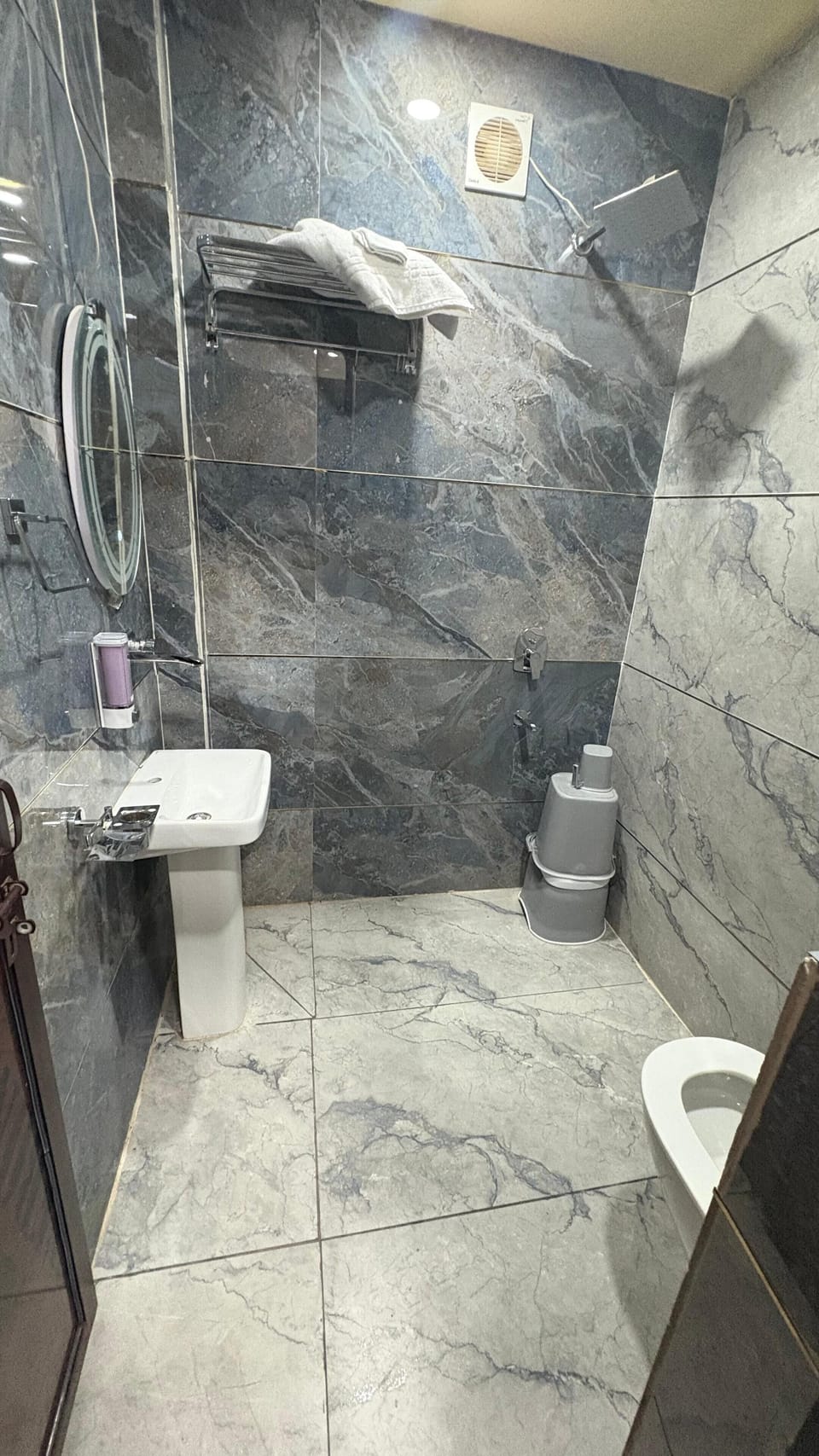 Shower, towels, soap, shampoo