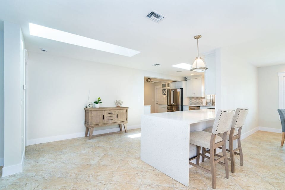 Pull up to this bar area to keep the kitchen crew company during meal prep.