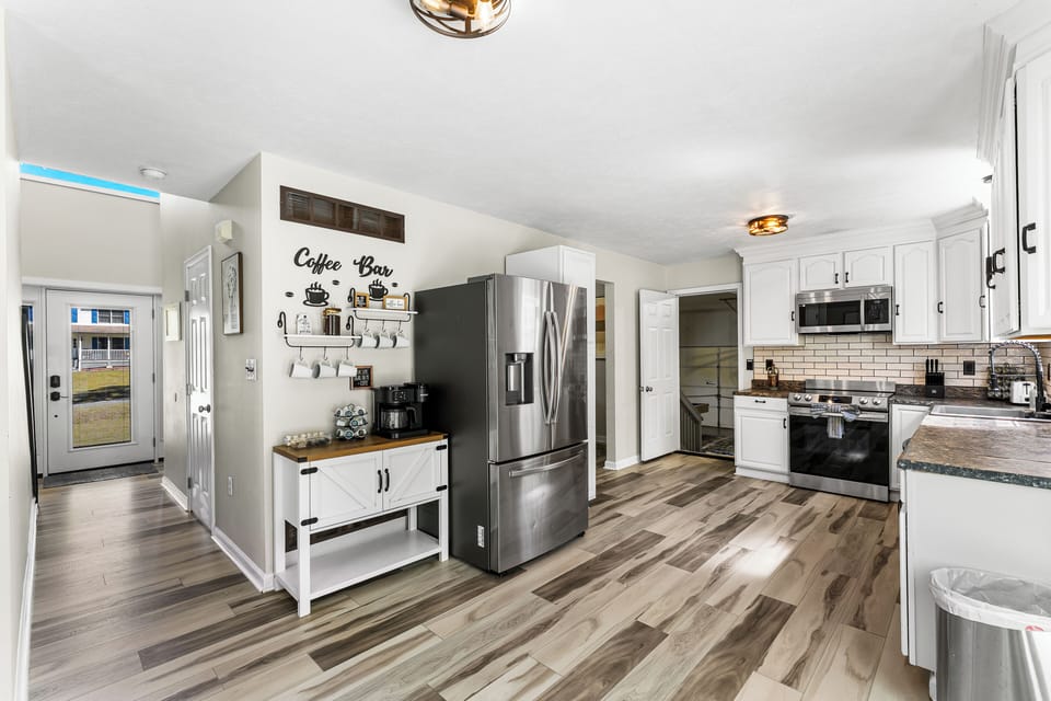 View of the entire kitchen and coffee area
