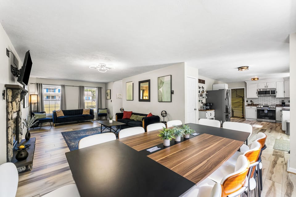 A view in the main living area and kitchen from the dining room
