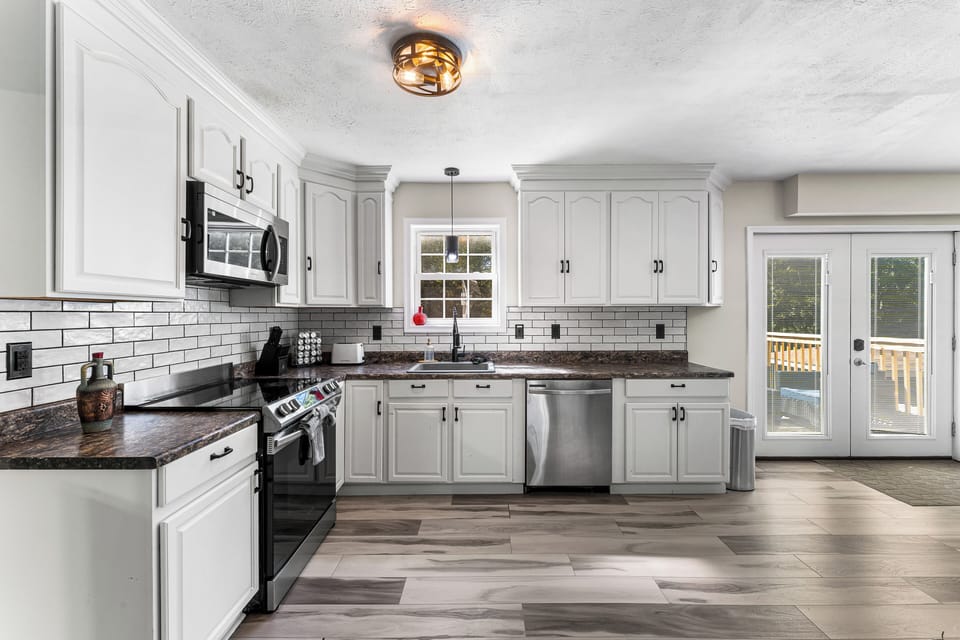 The kitchen is loaded with everything needed to cook the whole family dinner.
