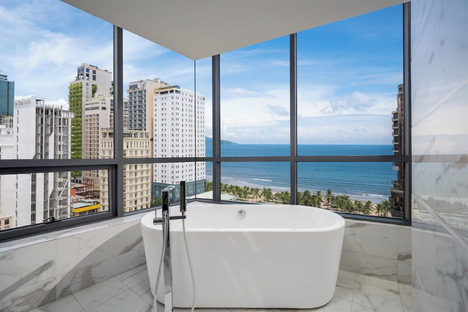Designer toiletries, hair dryer, bathrobes, slippers
