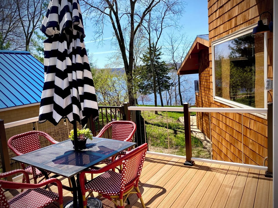Deck with view of lake 