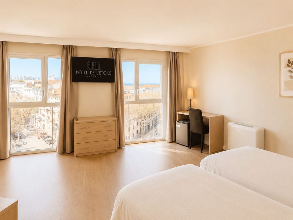 Superior Triple Room | Minibar, in-room safe, desk, laptop workspace