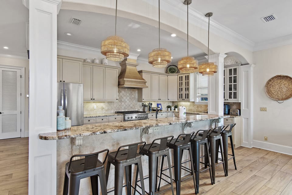 Cook in style with upscale appliances, custom cabinetry, and high quality cookware
