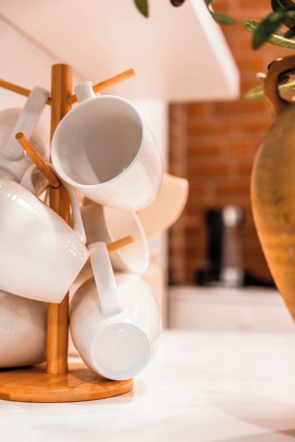 Neatly arranged coffee mugs adding a cozy and inviting touch to your stay