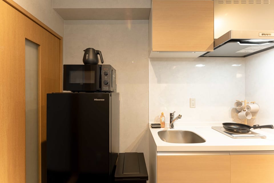 Comfort Quadruple Room, Balcony, City View | Microwave