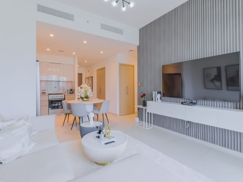Luxury Apartment, Balcony, City View | Living area | 55-inch Smart TV with digital channels