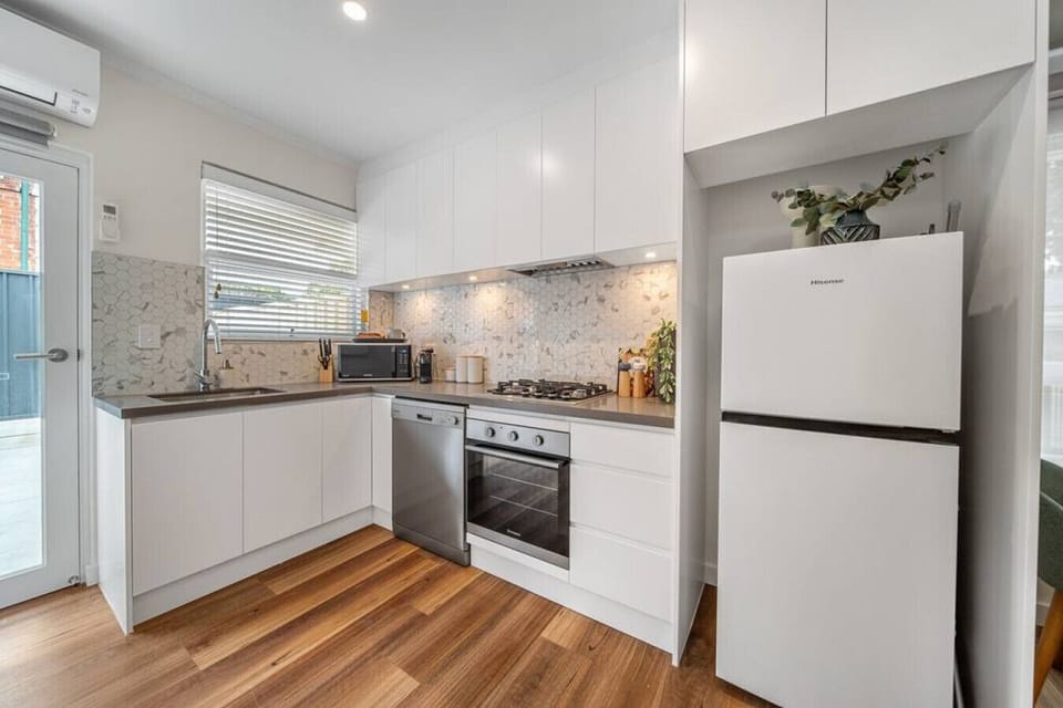 Start the day here with fresh coffee and sunshine streaming through, or prepare dinner after exploring nearby cafés on Henley Beach Road.