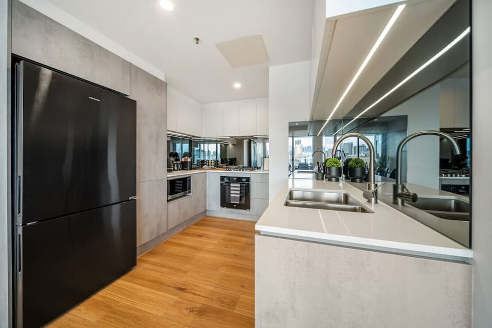 Cook with ease in the chef’s kitchen, complete with premium appliances and generous bench space.