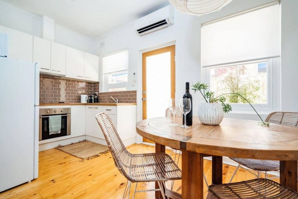 The kitchen and dinning area offers ample space to prepare meals and dine at home.