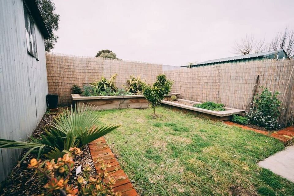 Step into the private garden and enjoy a peaceful outdoor space, perfect for fresh air and quiet moments.