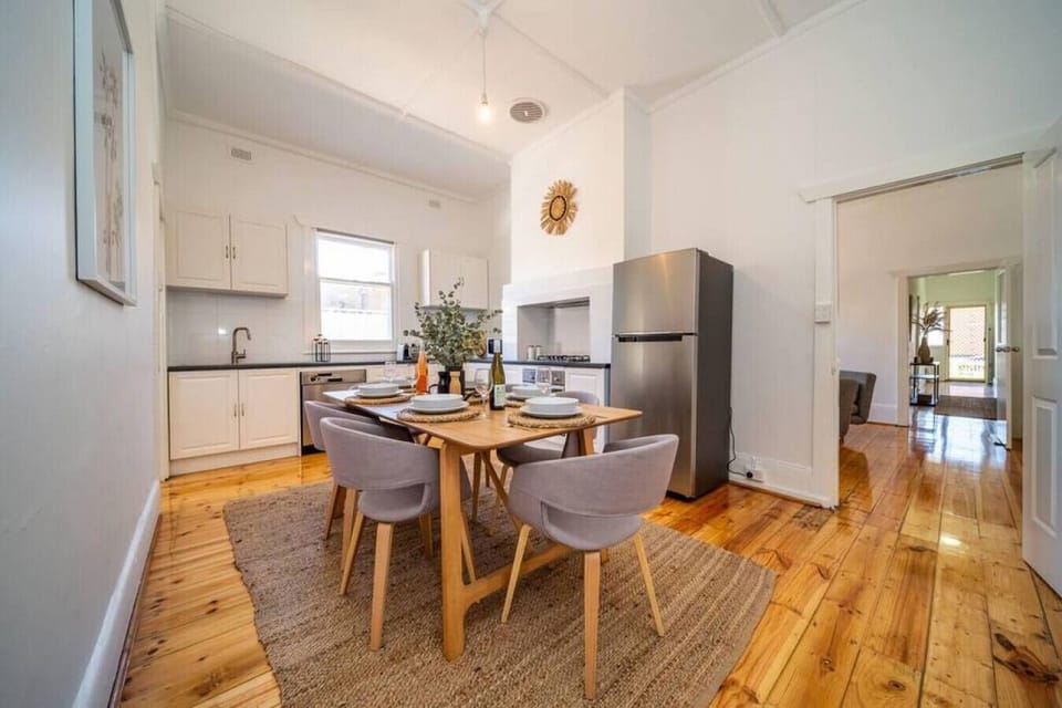 Cook, gather, and share meals with ease in the open-plan kitchen and dining area designed for relaxed time together.