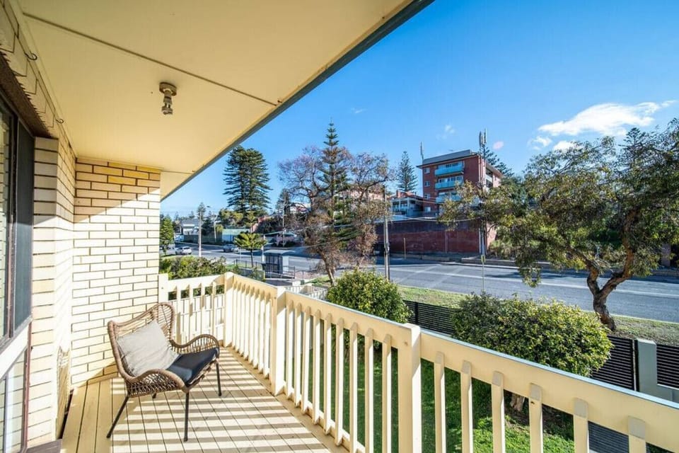 Start the day with coffee on the balcony as the sea breeze drifts in from nearby Grange Beach.
