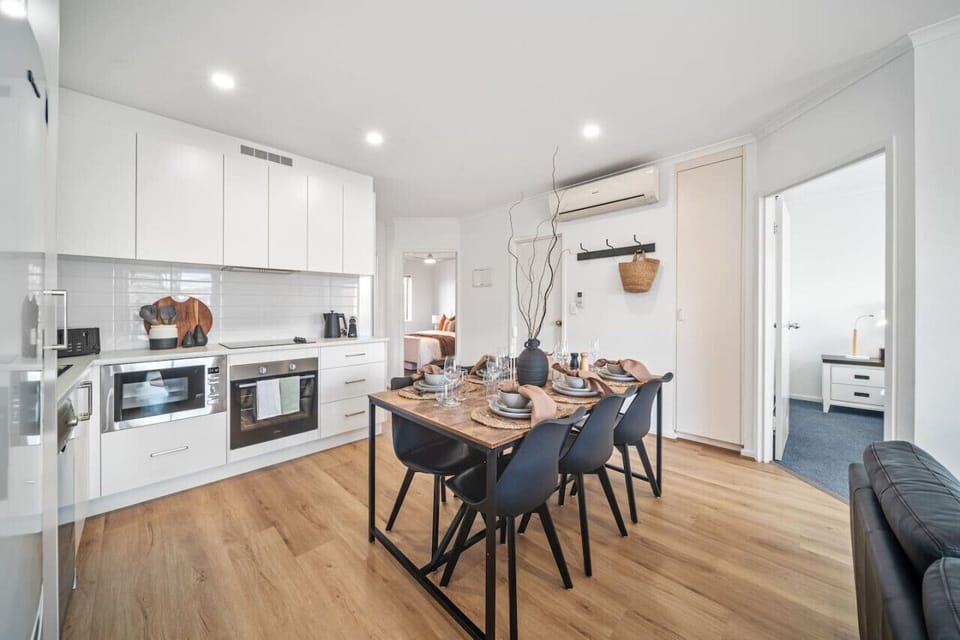 Come together over meals and conversation in the heart of the open-plan living space.
