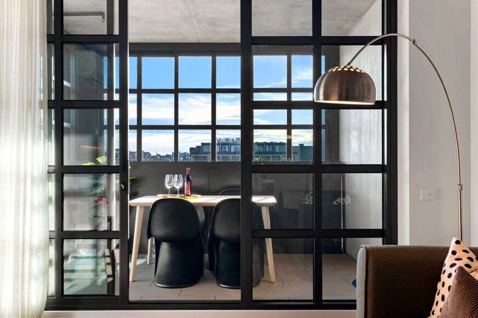 Enjoy a meal in the sun room dining area