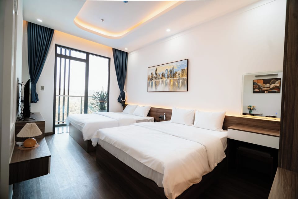 Executive Quadruple Room, Balcony, Hill View | Hypo-allergenic bedding available, memory foam beds, minibar, desk