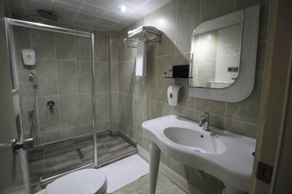 Hair dryer, slippers, soap, shampoo