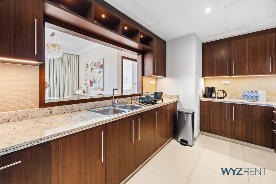 Apartment, City View | Private kitchen | Coffee/tea maker