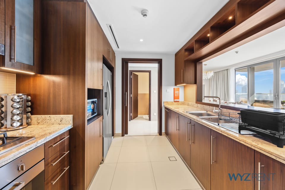 Apartment, City View | Private kitchen | Coffee/tea maker
