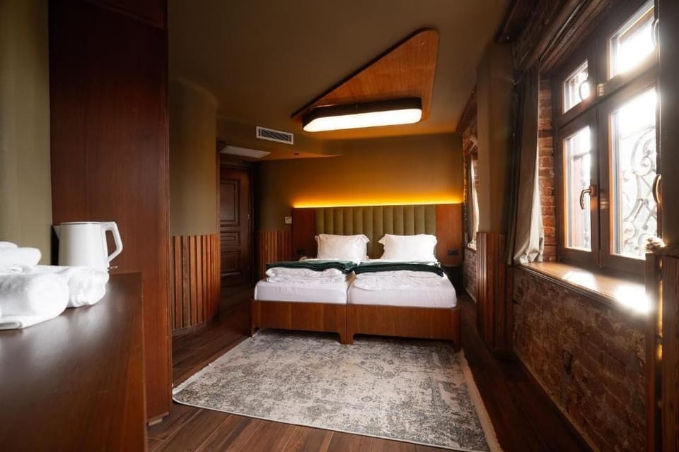 Quadruple Room, City View | Desk, laptop workspace, soundproofing, free WiFi
