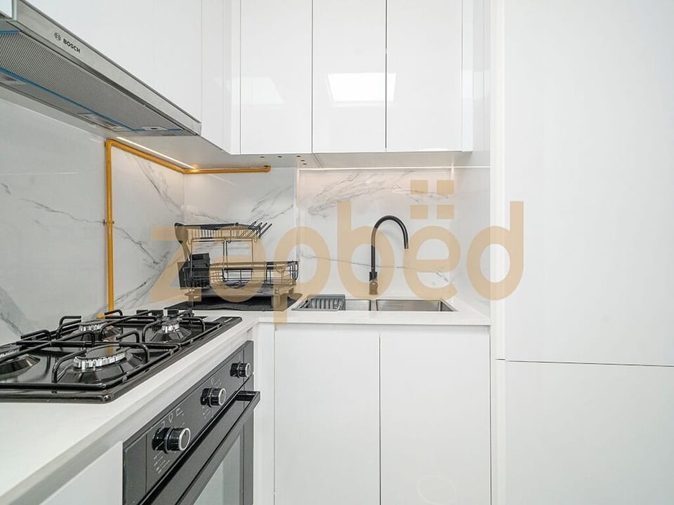 Apartment, Balcony, City View | Living area | Flat-screen TV