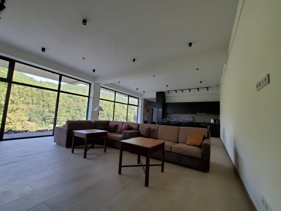 Deluxe Double Room, Balcony, Mountain View | Shared kitchen | Full-size fridge, oven, stovetop, dishwasher