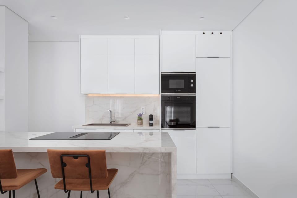 Deluxe Apartment, Balcony, City View | Private kitchen | Full-size fridge, microwave, oven, stovetop