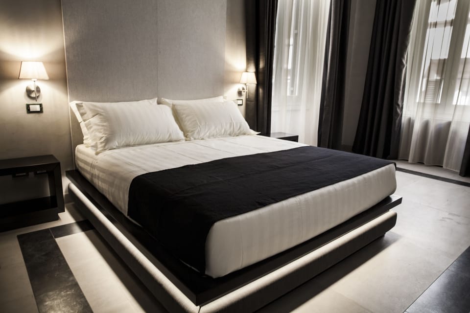 Egyptian cotton sheets, premium bedding, down comforters, free minibar