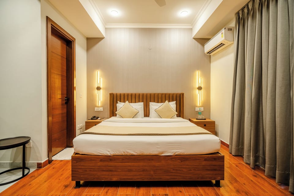 Premium bedding, desk, laptop workspace, blackout drapes