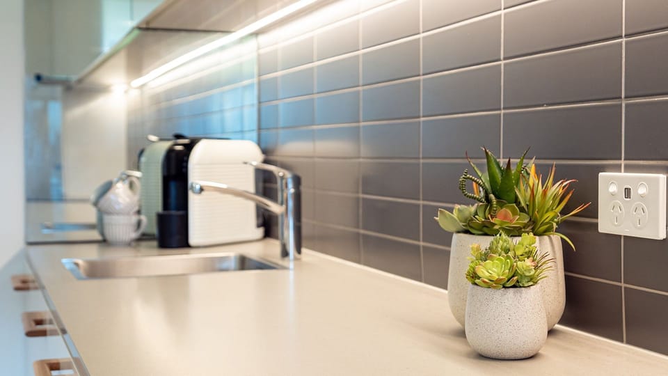 Surf N Turf | Downstairs full kitchenette | Coffee pod machine 