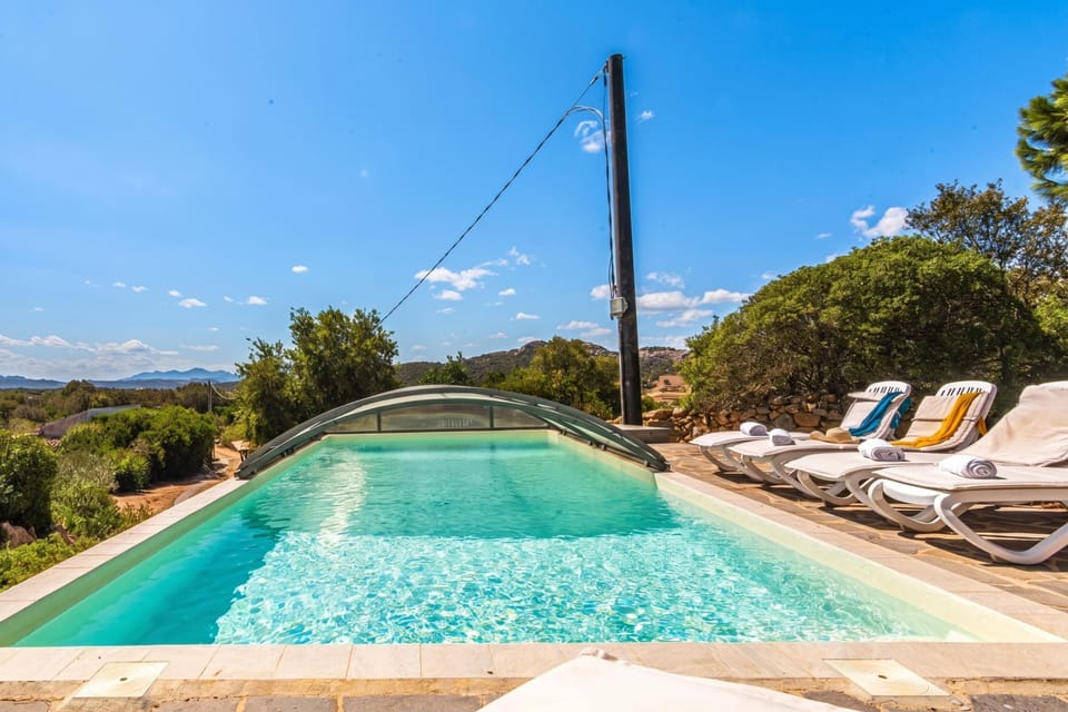 Family Villa, 4 Bedrooms, Fireplace, Mountainside (Villa La Licciola) | Pool | Seasonal outdoor pool