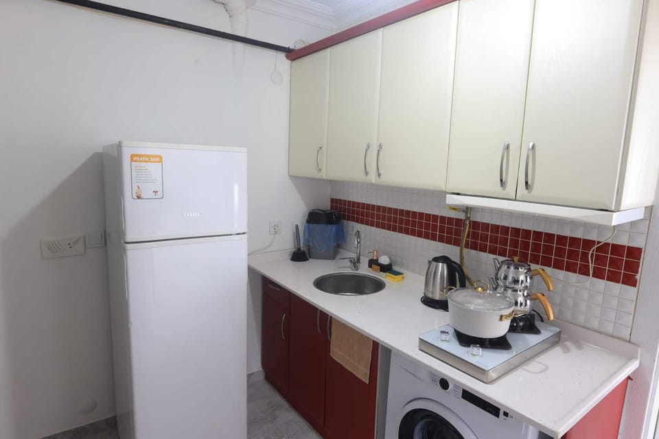Classic Condo, Balcony | Private kitchen | Full-size fridge, stovetop, cookware/dishes/utensils