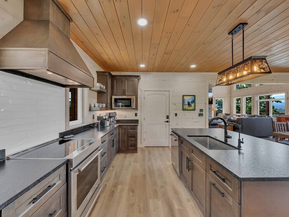 With its open flow to the dining and living room, the kitchen is as much a gathering place as it is a space to cook.